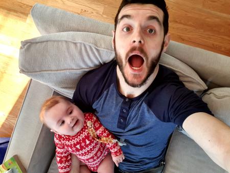 Paul with glasses reads to Mark