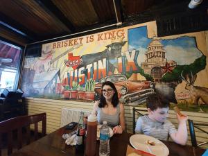 Tyren and Max enjoying the barbecue
