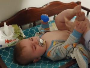 Mark is finding eggs even while he's getting a diaper change!