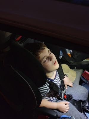 After a long day, Max fell asleep in the car on the way home