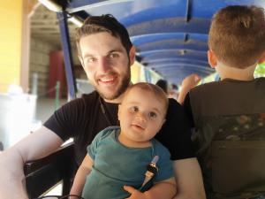 Papa and the boys riding the Travel Town Trolley