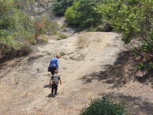 Junior Ranger Max leads us in a hike behind Travel Town