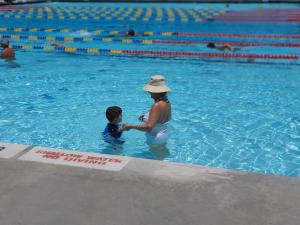 Glamma and Max swimming in the local pool