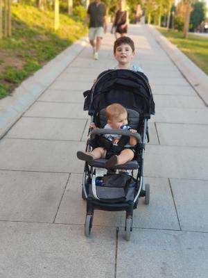 Max loved being helpful, and wanted to be the one to push Mark in the stroller
