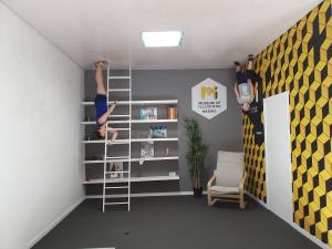 Tyren and Max having a stroll on the ceiling at the Museum of Illusions