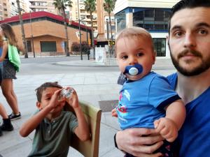 Baby ho! Eric spots Paul and Mark at a restaurant in Málaga