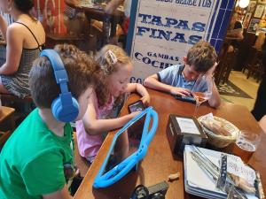 Max, Eric and Esther enjoy a tapas meal together in the modern fashion