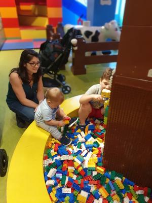 Tyren, Max and Mark at LegoLand, taking a rest from all that walking!