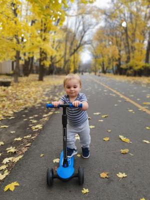 Mark riding his scooter